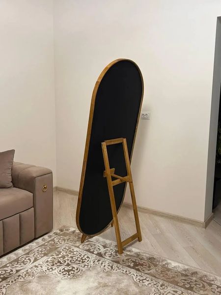 Capsule-Shaped Full-Length Mirror in a Natural Wood Frame for Bedroom photo