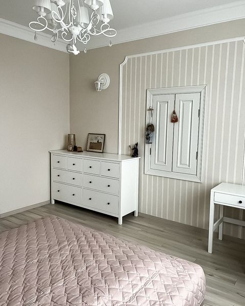White dresser on legs "Hames" made of natural wood photo